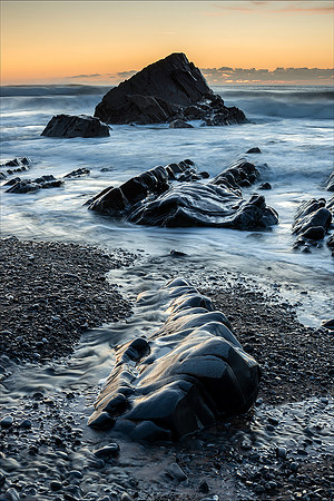 Blue rocks and a fiery sky, Sandymouth, Cornwall.