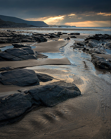 Gold and blue on The Strangles, Cornwall.