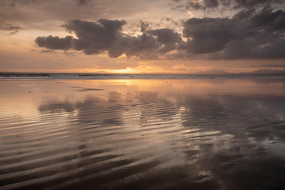 Golden light on Harlech Beach.