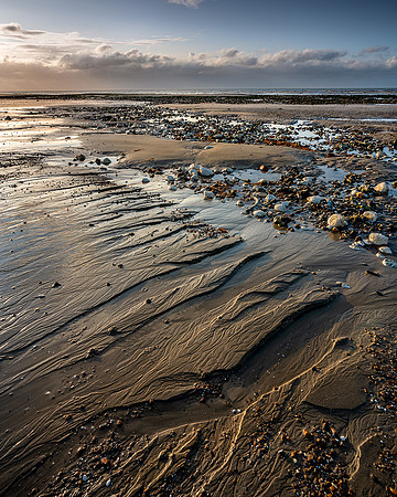Low tide sand patterns.