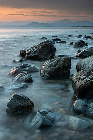 Last light on distant Snowdon, Llandangw Beach, Gwynned.